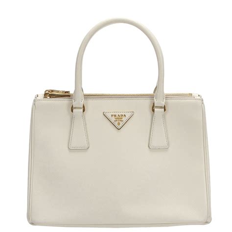 creme prada purse|Prada purse price.